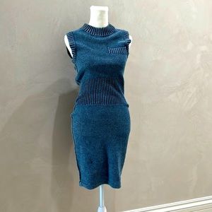 Form fitting soft dress. Comes to mid thigh. Perfect for any season